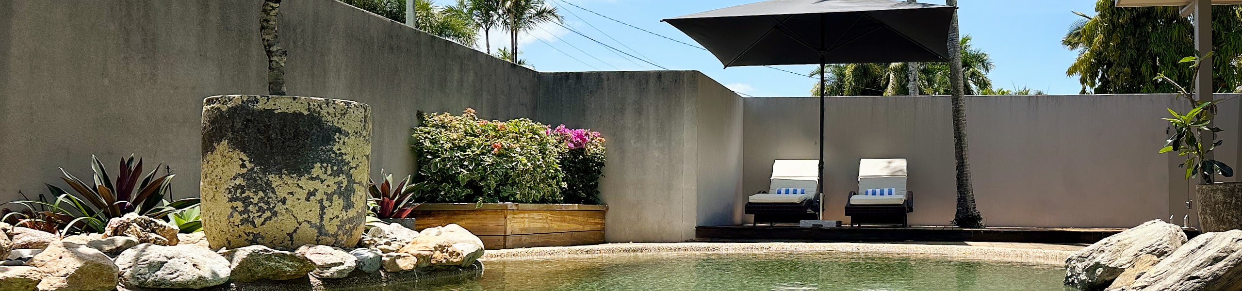 The swimming pool at Le Palmier holiday house in Port Douglas.